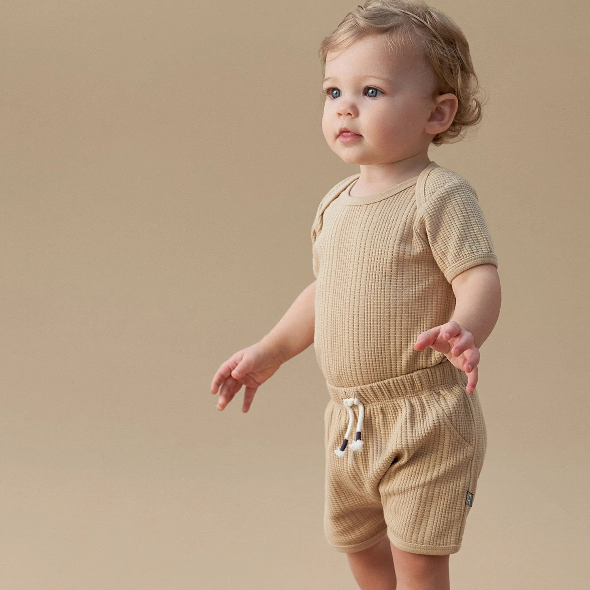 Baby Neutral Tan Dumpling Romper - Image 2