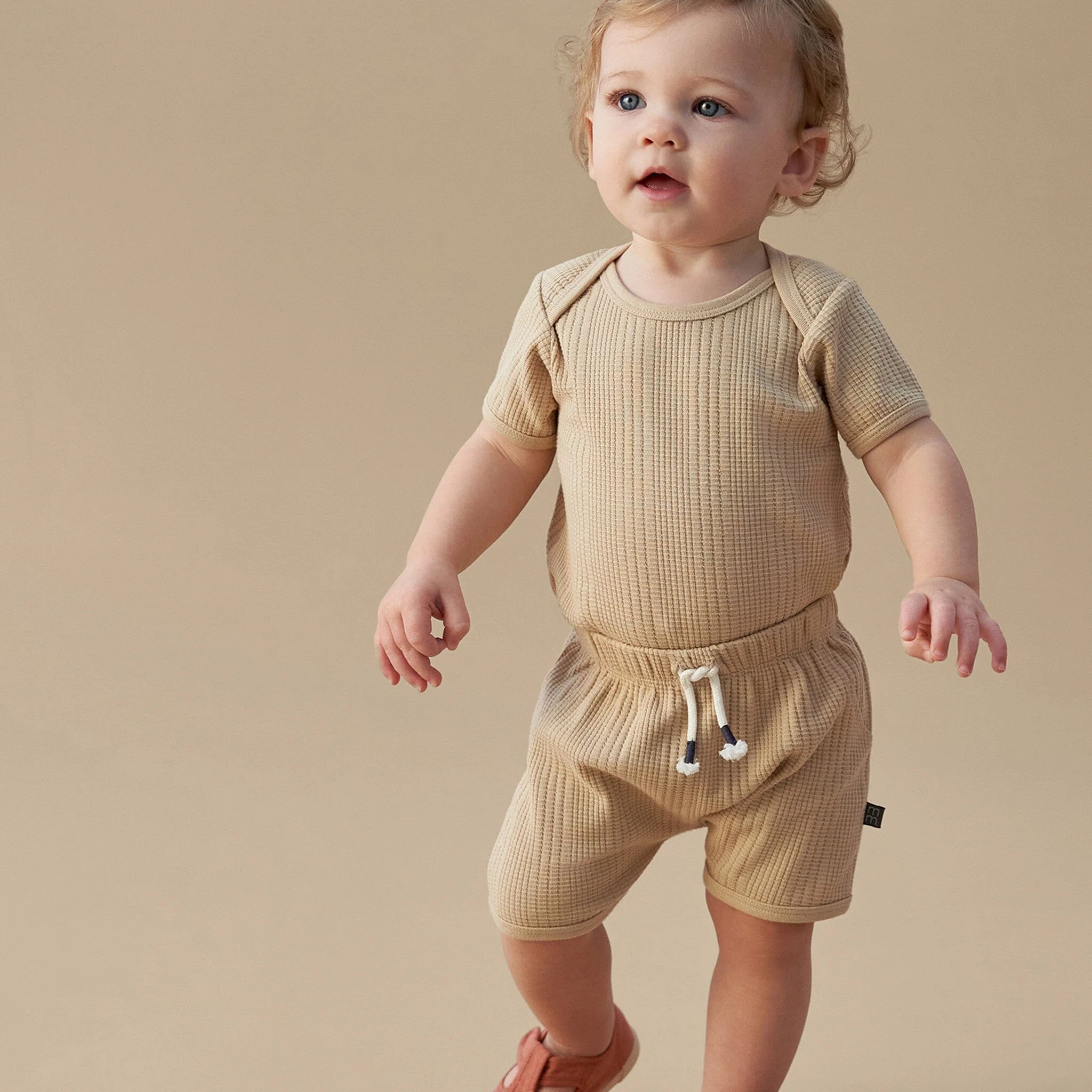 Baby Neutral Tan Dumpling Romper - Image 3